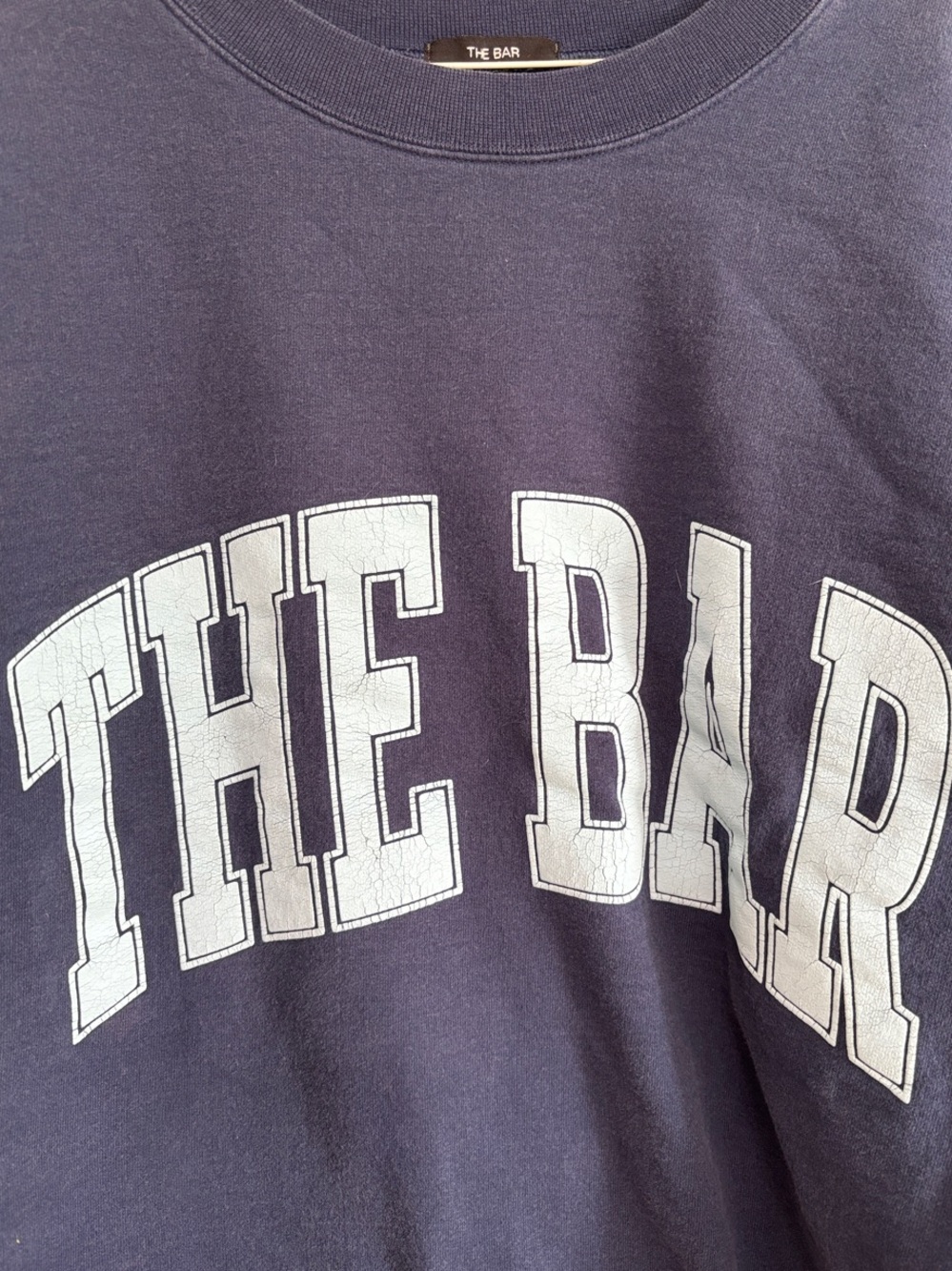 The Bar Women’s Navy Sweatshirt with Light Blue Logo
